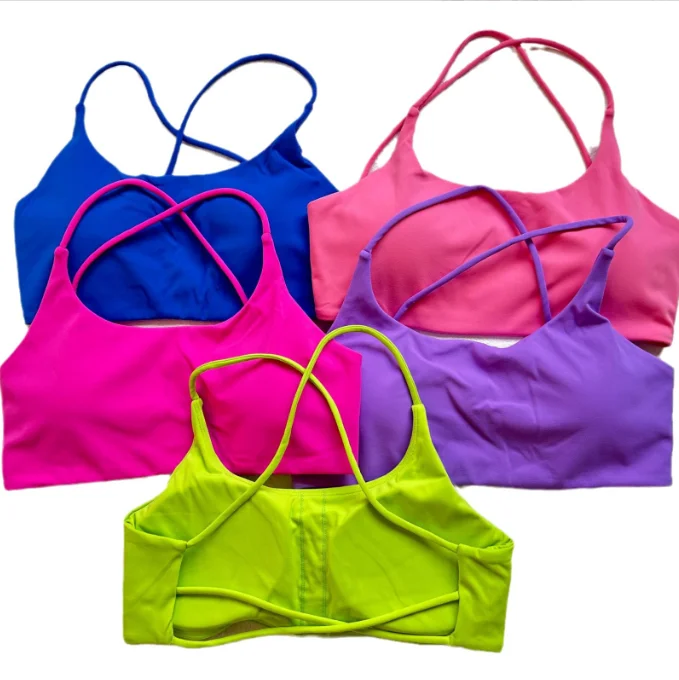 High-Quality Yoga Clothing At Budget-Friendly Prices A nude fitness bra with thin straps and a cut-out back High-Quality Yoga Clothing At Budget-Friendly Prices A nude fitness bra with thin straps and a cut-out back